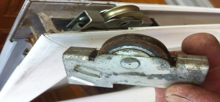 screen door roller repair in University
